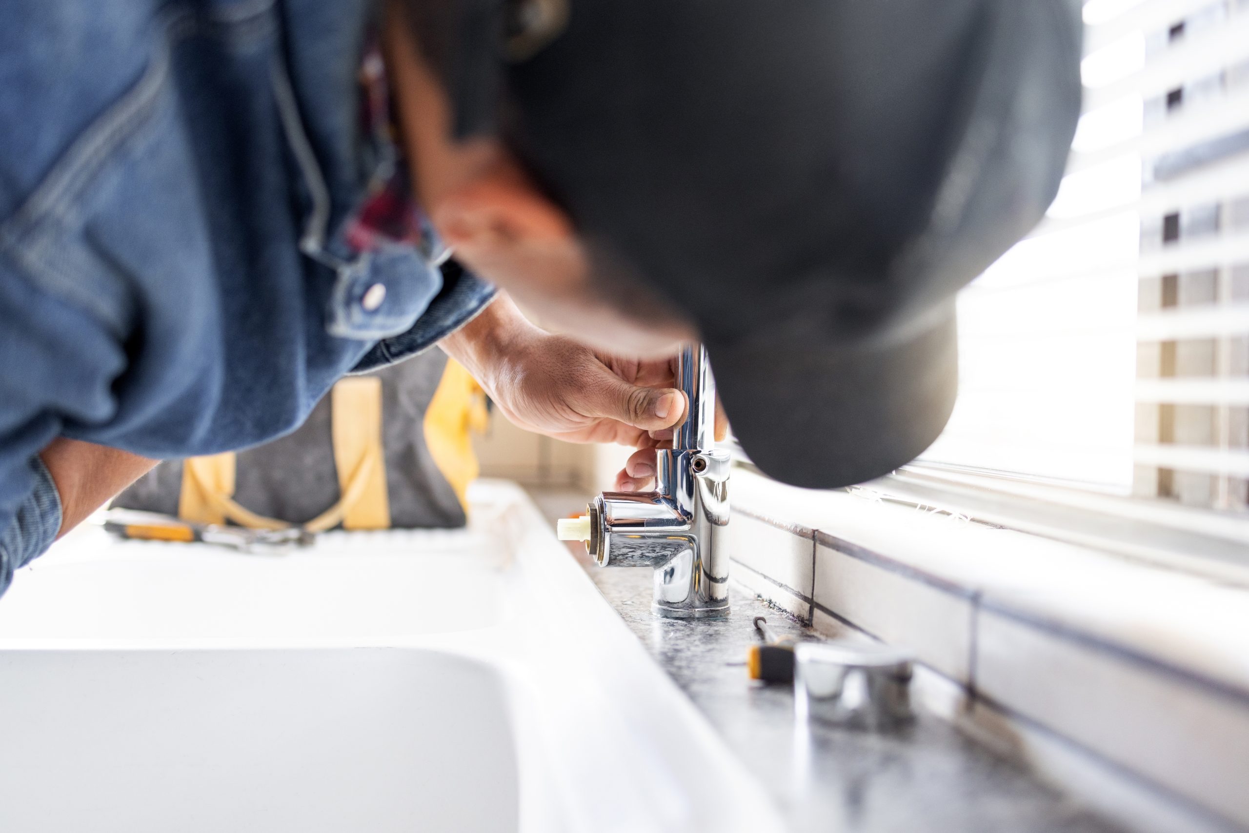 plumber-fixing-faucet-plumbing-and-maintenance-wi-2025-04-06-11-30-33-utc